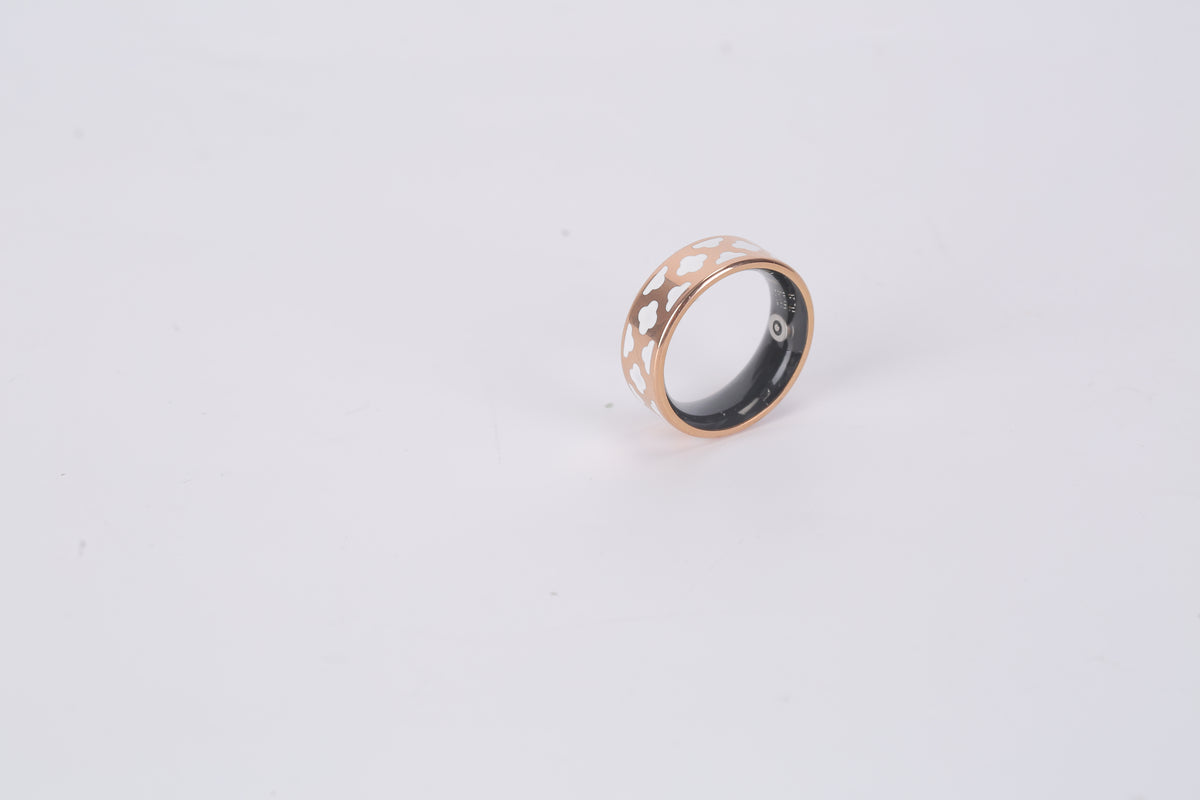 White titanium smart ring with magnetic charging dock